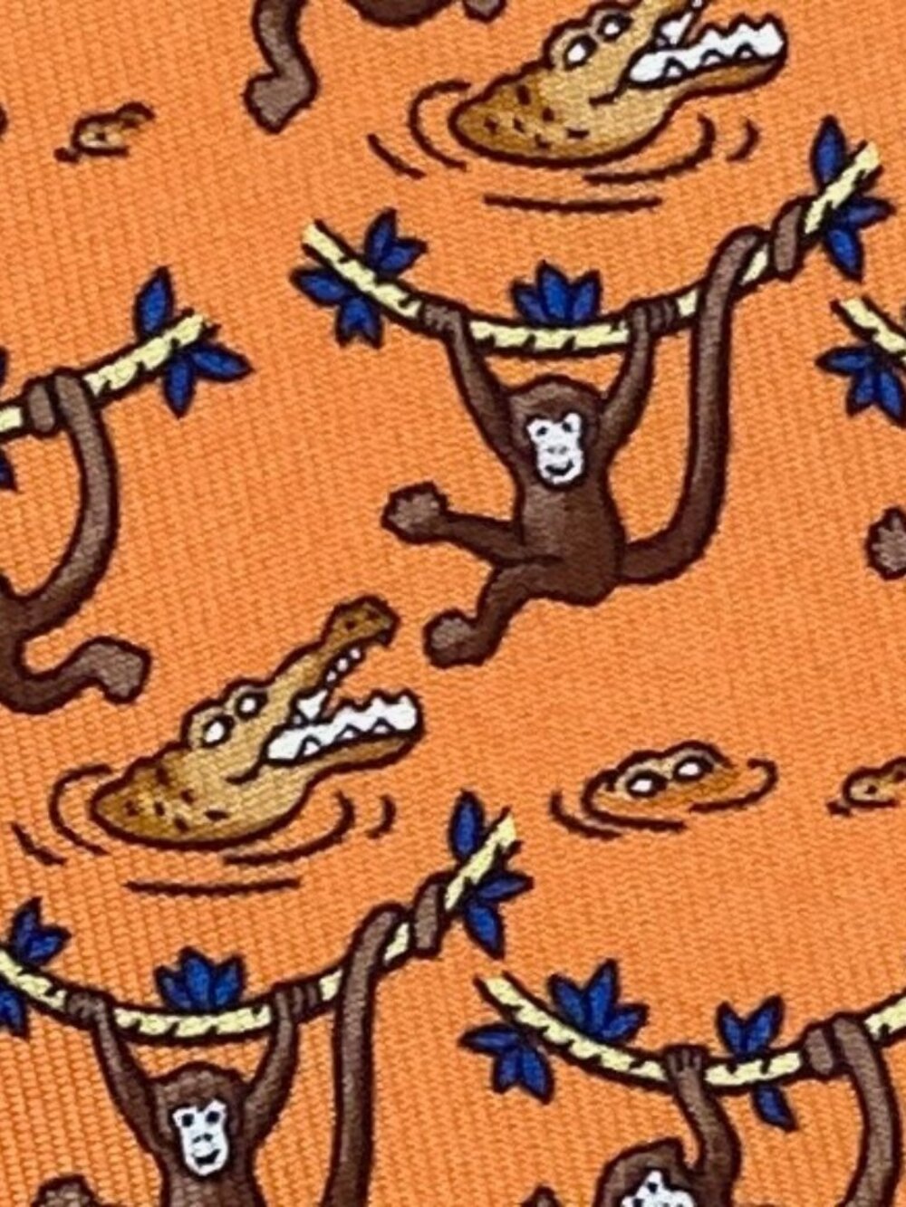 100% REAL RARE HERMES TIE - ORANGE MONKEY SWINGING ON VINES ABOVE GOLD CROCODILE